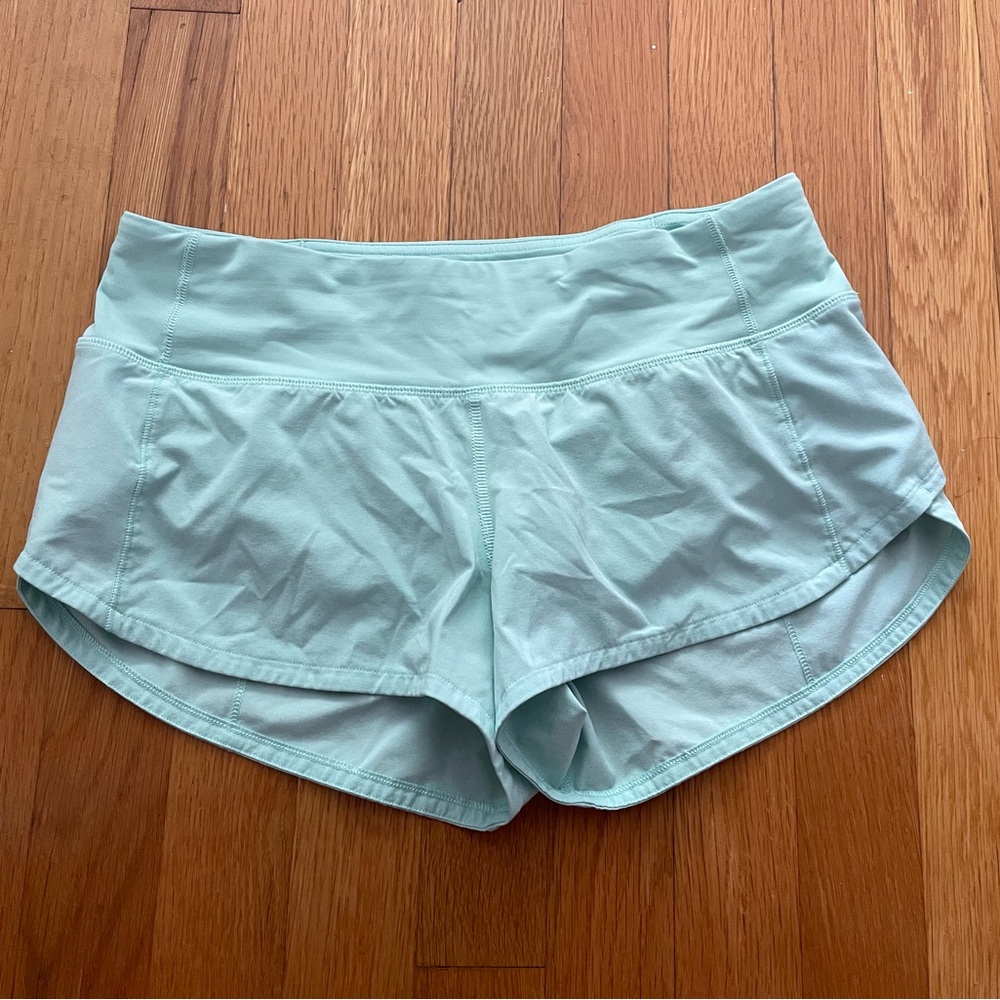 Lululemon size 4 2.5” speed up low rise run shorts- tonic sea